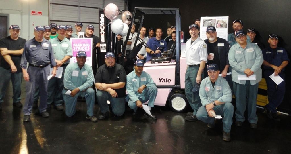 Barclay technicians with pink forklift