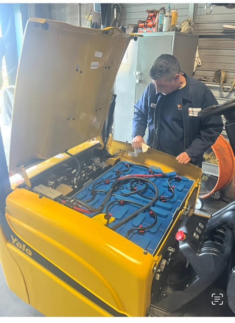 Forklift battery being worked on